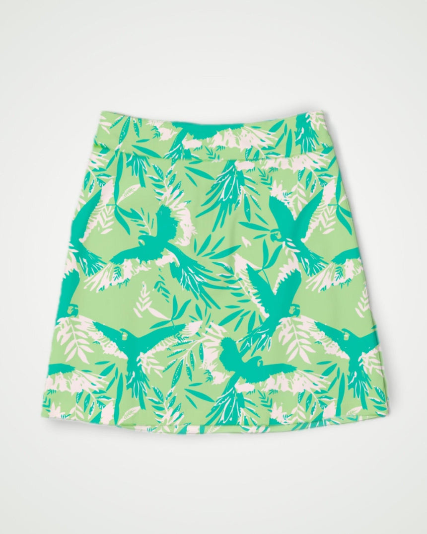 Green skort with bird and leaf pattern on a white background