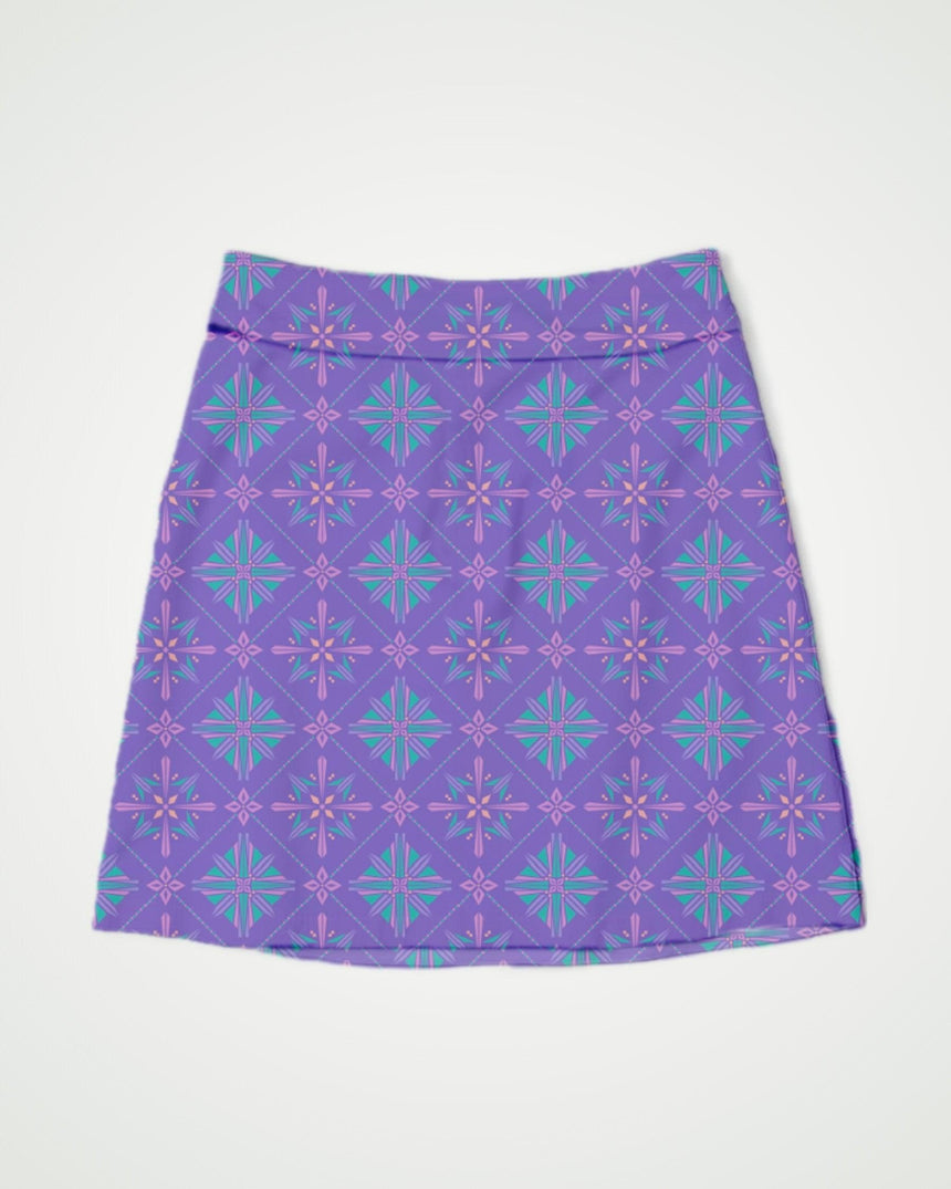 Purple skort with geometric pattern on a white background