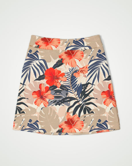 Golf skirt with tropical floral pattern on a plain background
