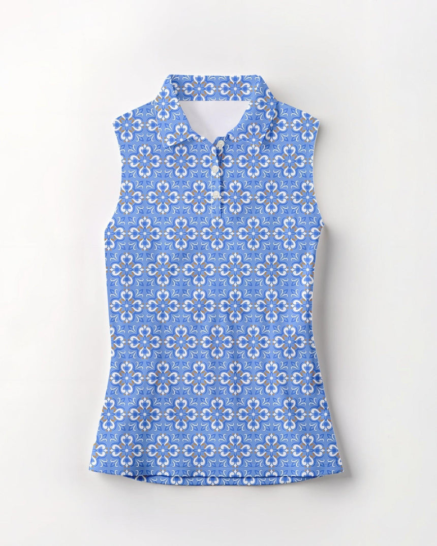 Blue sleeveless golf shirt with floral pattern on a white background