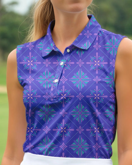 Person wearing a sleeveless purple patterned shirt outdoors