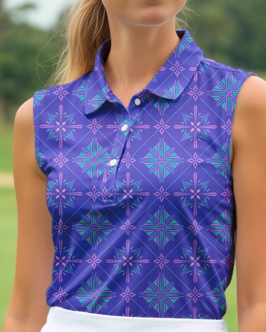 Person wearing a sleeveless purple patterned shirt outdoors