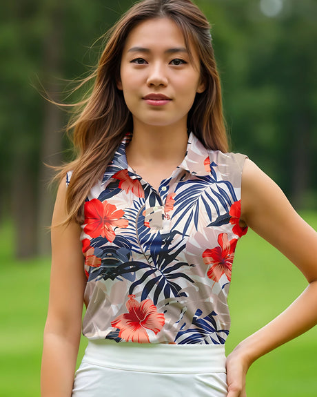 Woman wearing a floral sleeveless golf polo shirt with a blurred green background
