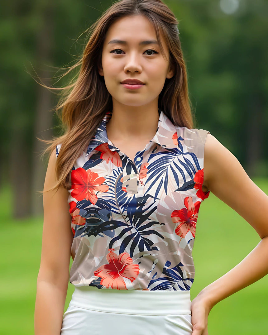 Woman wearing a floral sleeveless golf polo shirt with a blurred green background