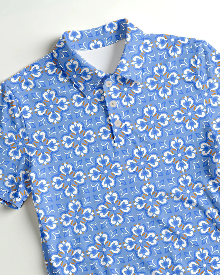 youth short sleeve golf polo in Blue Mosaic print - fabric closeup front view