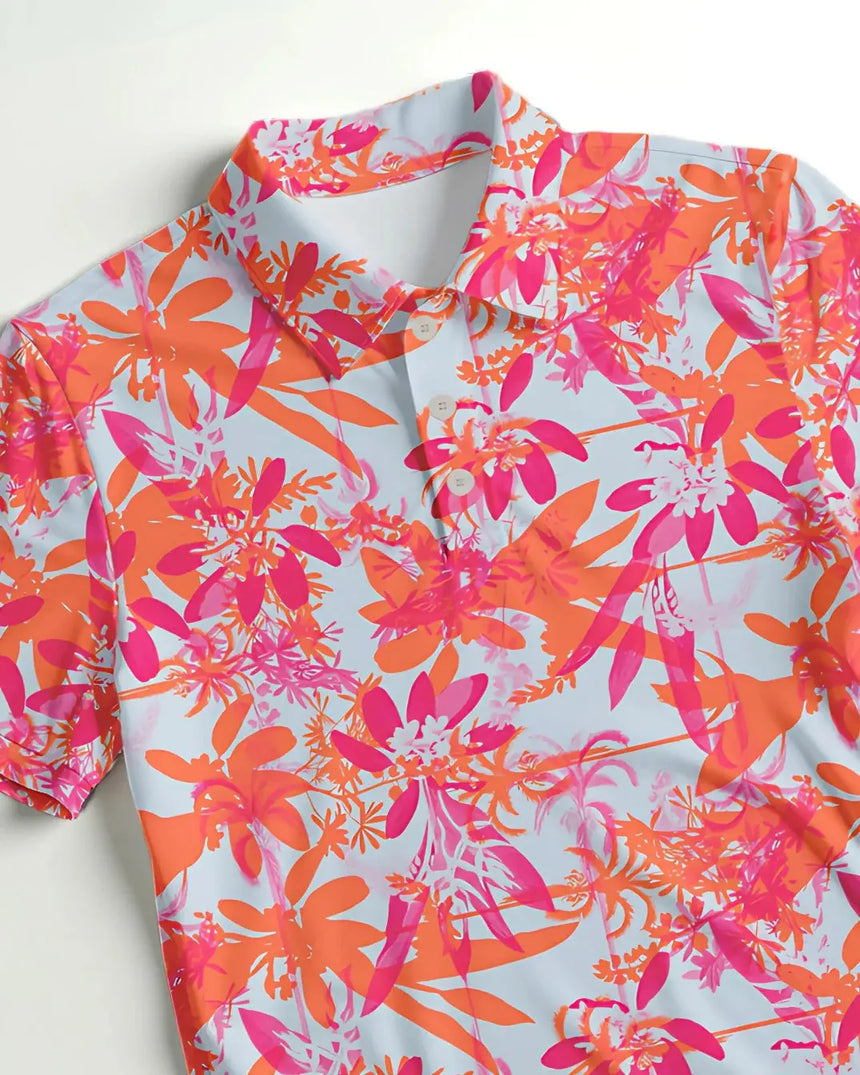 youth short sleeve golf polo in Hot Tropic print - fabric closeup front view