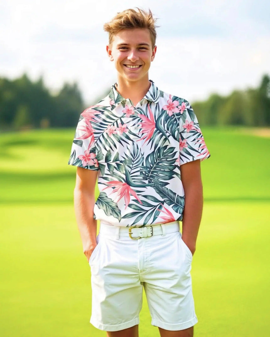 youth short sleeve golf polo in Tropical Fare print - model wearing on course