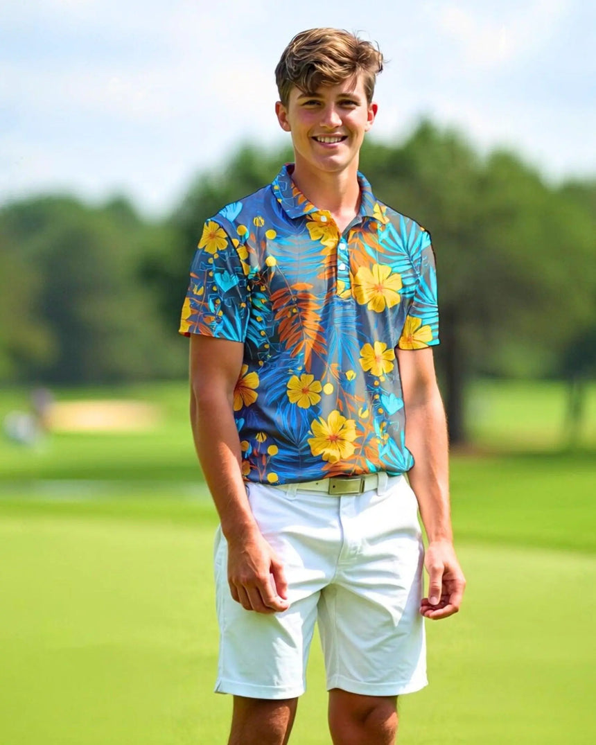 youth short sleeve golf polo in Tropical Mirage print - model wearing on course