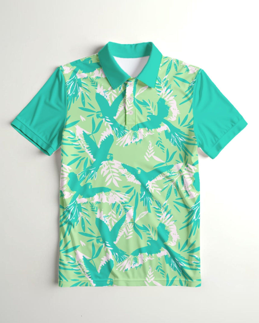 Short sleeve youth polo shirt with green and teal pattern of tropical birds