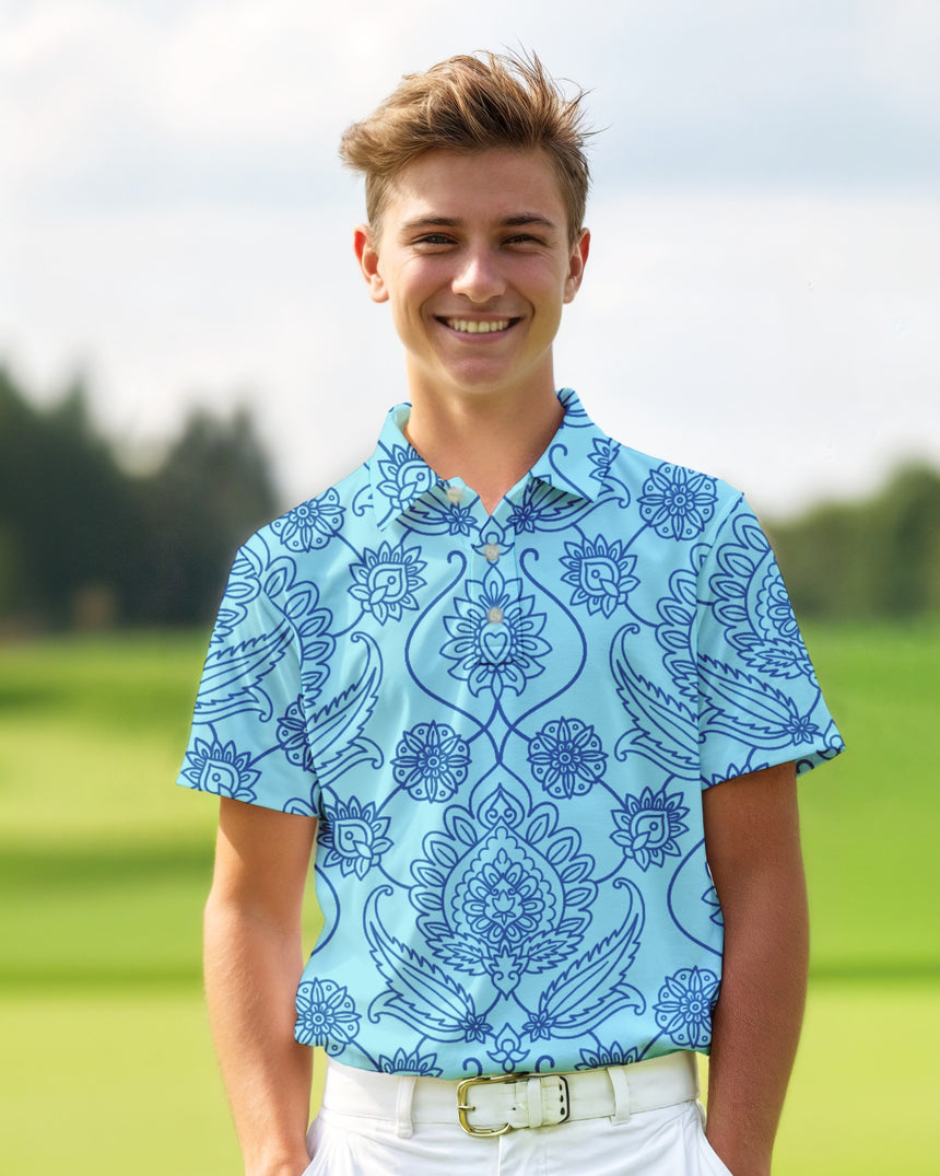 Teenage boy wearing a blue patterned shirt on a golf course