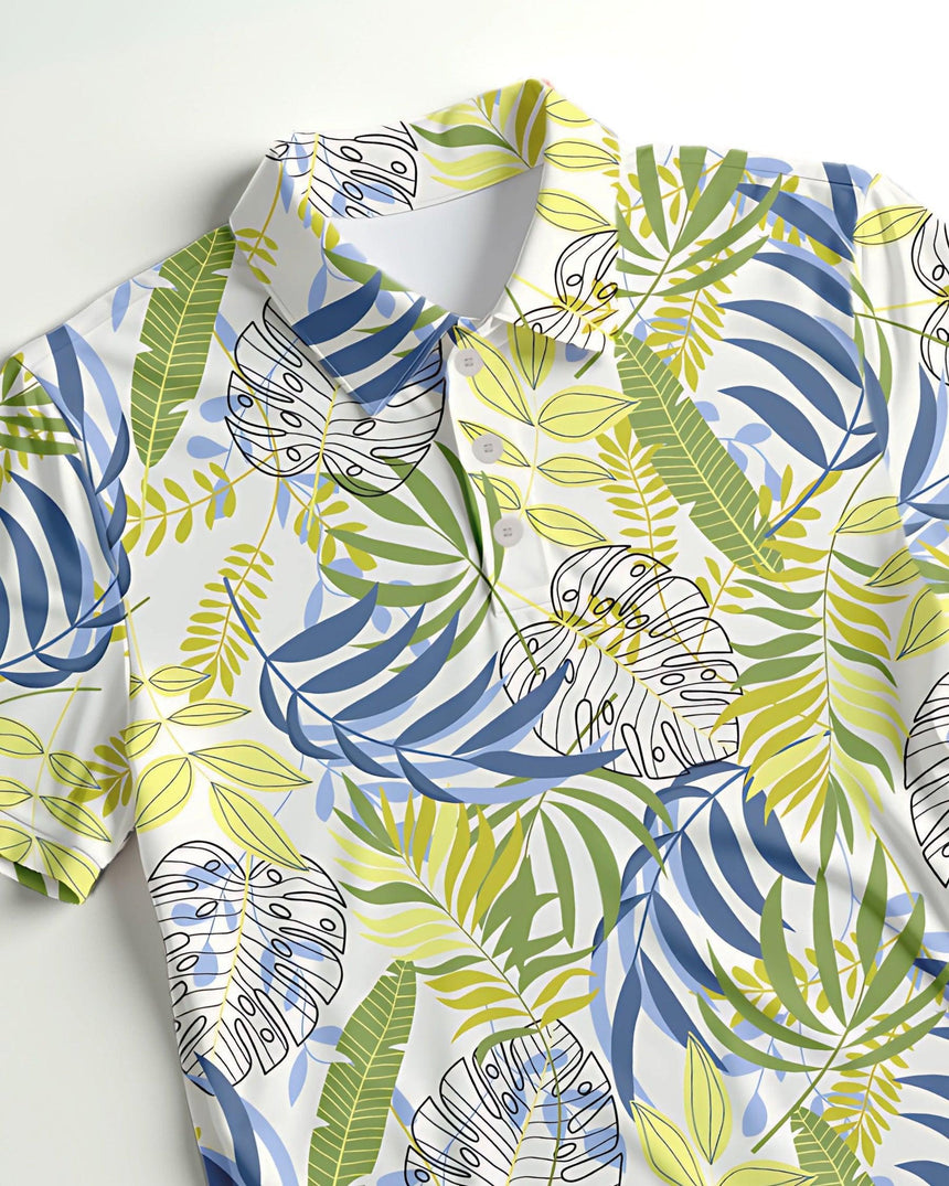 Polo shirt with tropical leaf pattern on a white background