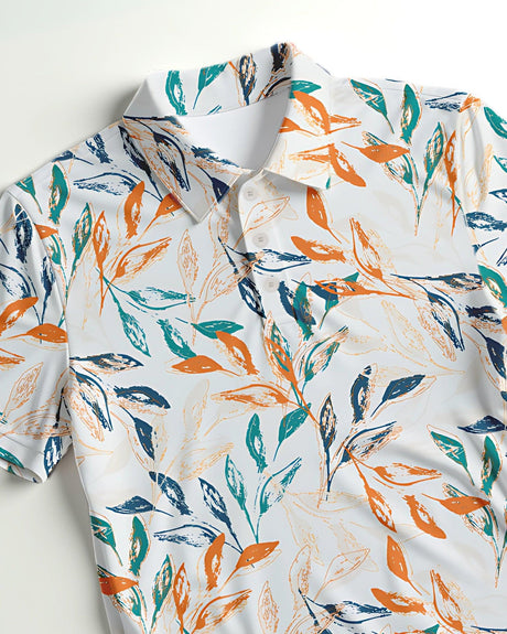 Short-sleeve golf shirt with colorful leaf pattern on a light background