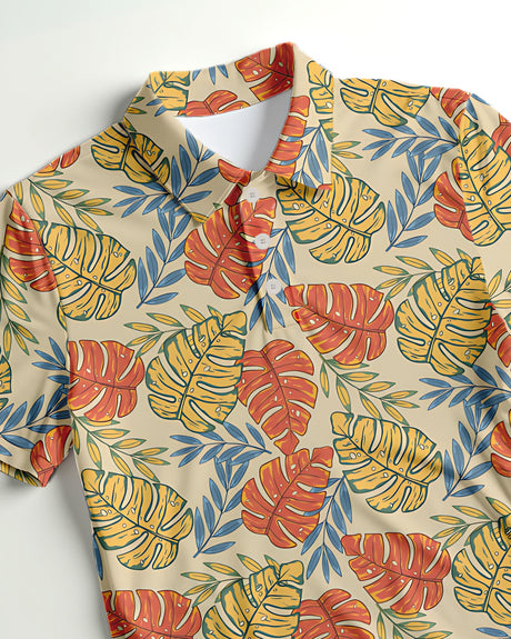 Colorful tropical leaf patterned shirt on a white background