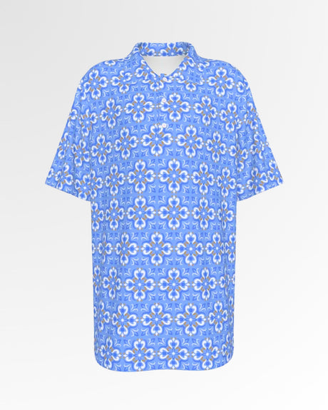 Golf polo shirt with a blue, white, and tan floral pattern.