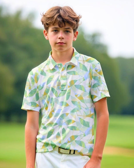A young man models a golf polo with a leaf pattern.