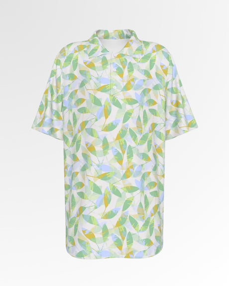 Golf polo shirt with a green, yellow, and blue leaf pattern on a white background.