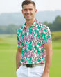 Man wearing a colorful floral print golf polo shirt on a golf course