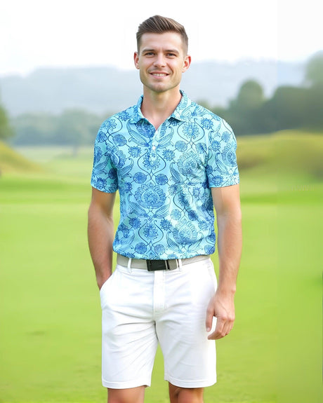 A man on a golf course wearing a blue floral print golf polo shirt