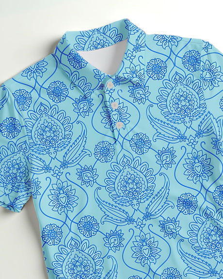 Close-up of a blue floral print golf polo shirt