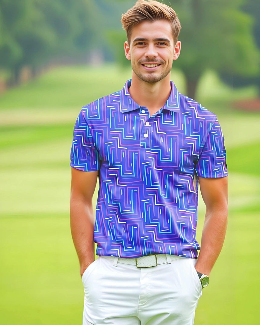 Man wearing a blue geometric patterned polo shirt on a golf course