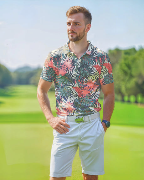 Man wearing a colorful floral polo shirt and white shorts on a golf course.