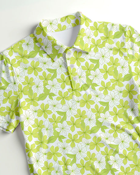 Close-up of a green and white floral print golf polo