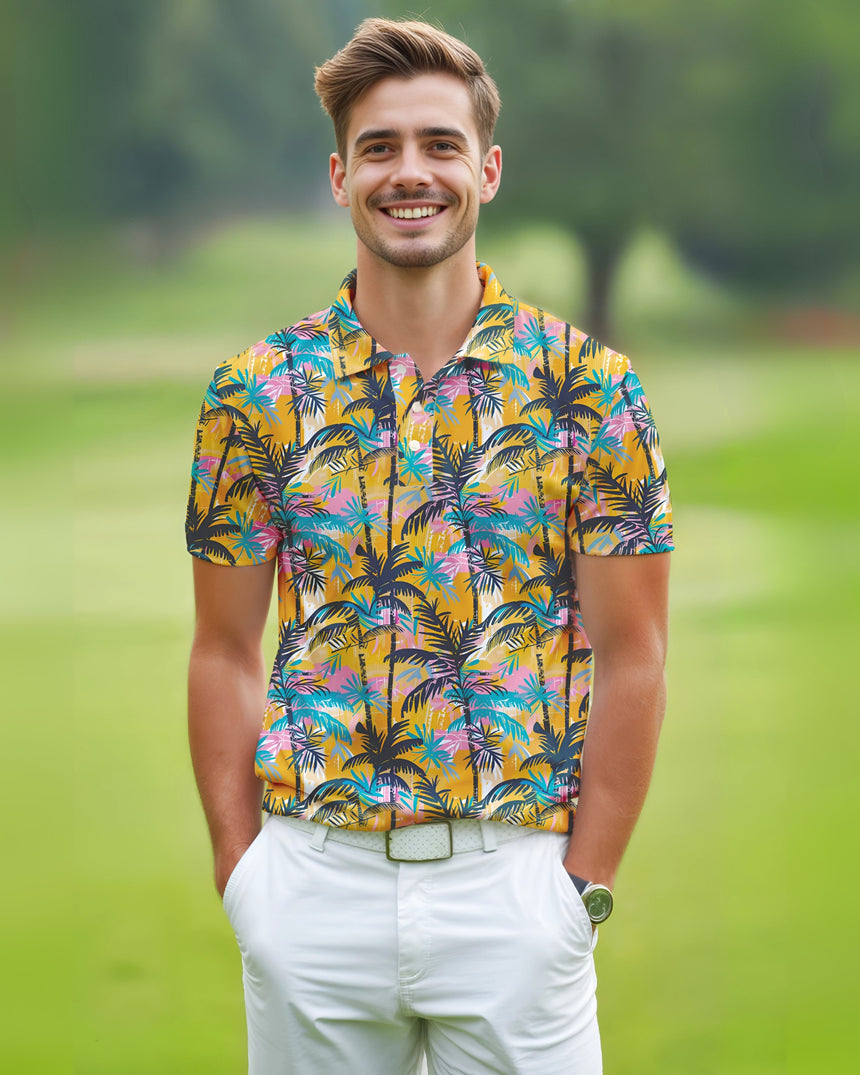 Man on a golf course wearing a colorful tropical print golf shirt