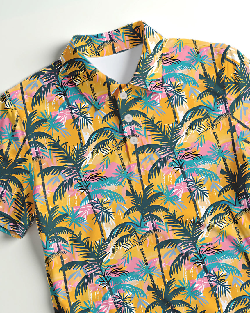 Close-up of a colorful tropical print golf polo with palm tree pattern