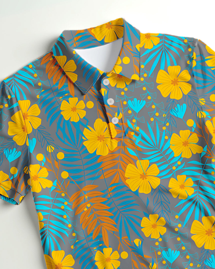 Hawaiian polo shirt with yellow flowers and blue leaves on a gray background