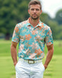 Man wearing a colorful floral polo shirt on a golf course