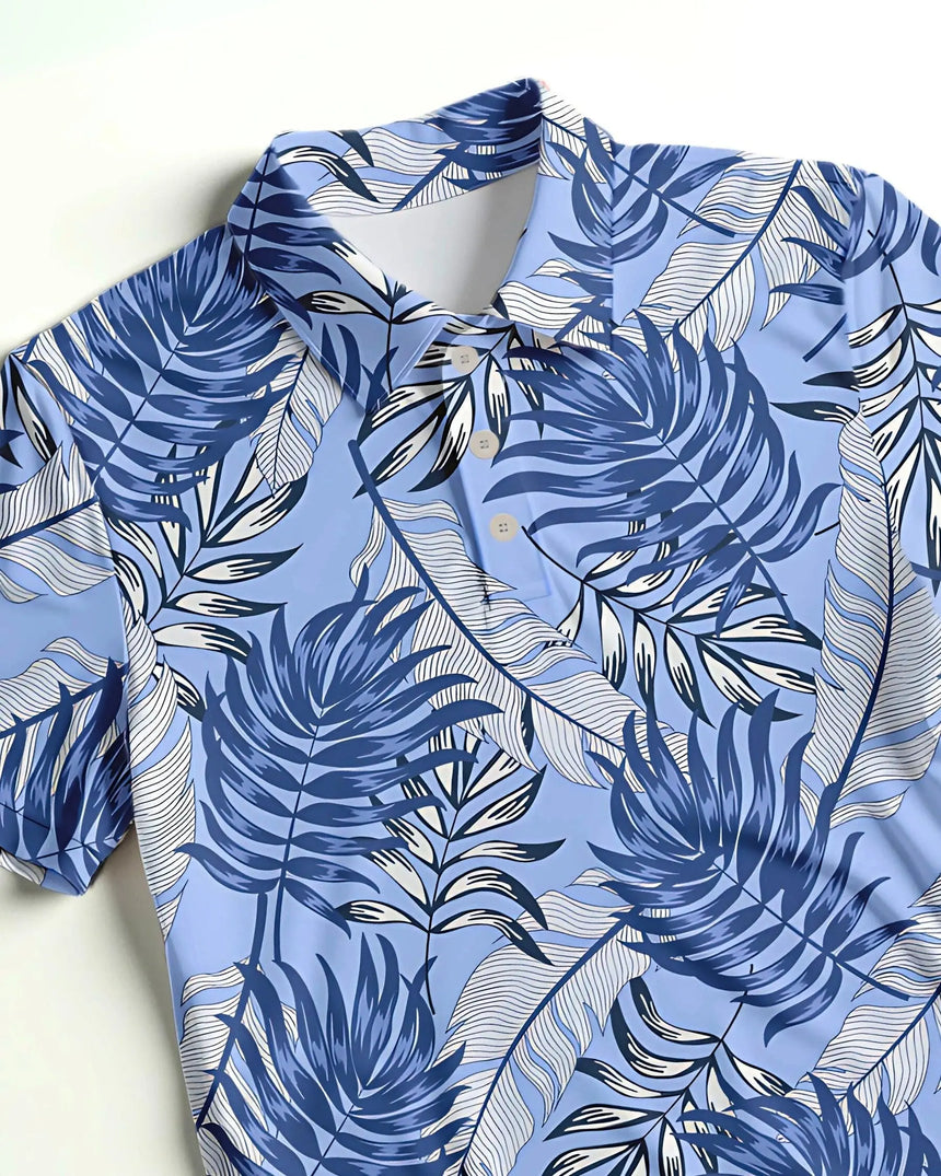 men's short sleeve golf polo in Blue Palms print - fabric closeup front view