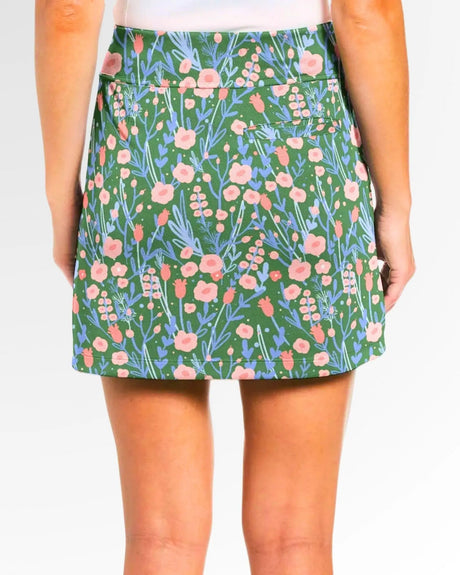 women's fitted golf skort with pockets in Back Nine Blossoms print - back view