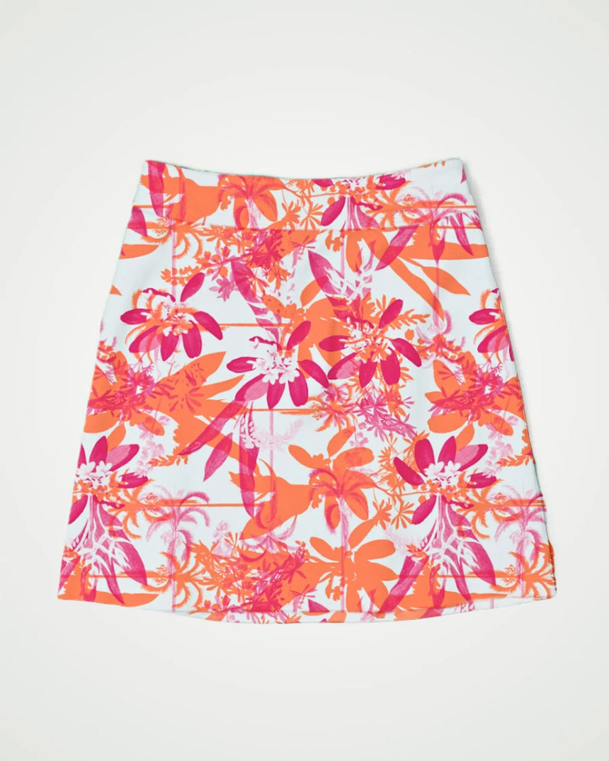 women's fitted golf skort with pockets in Hot Tropic print - front view