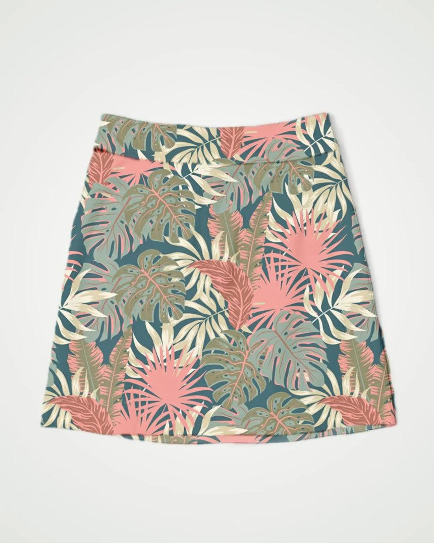 women's fitted golf skort with pockets in Palm Party print - front view