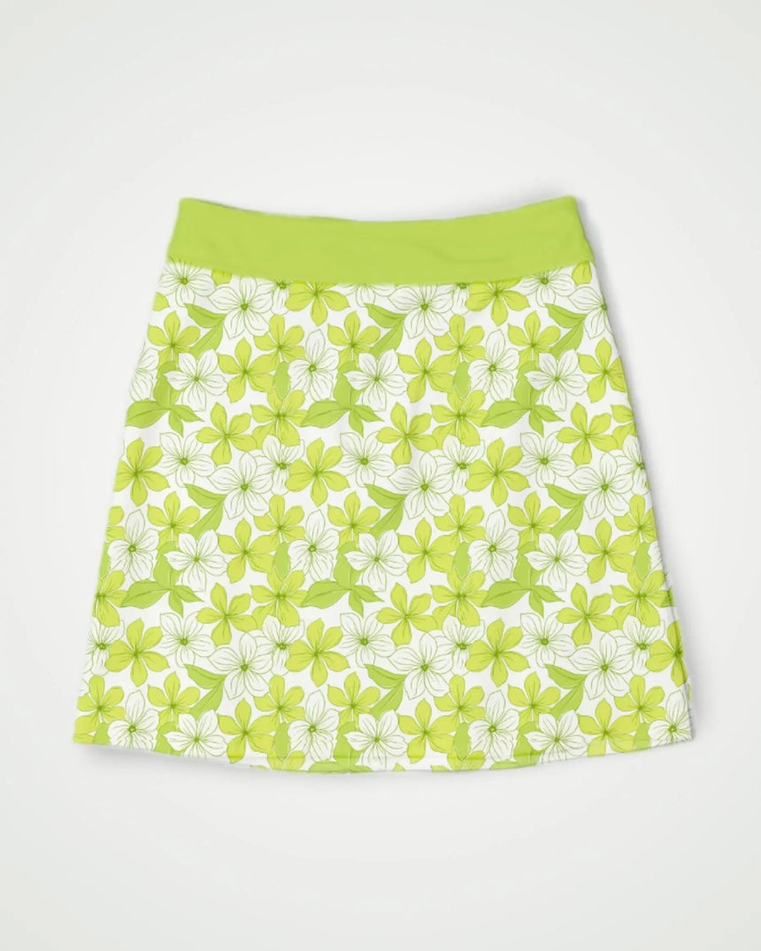 women's fitted golf skort with pockets in Spring Greens print - front view