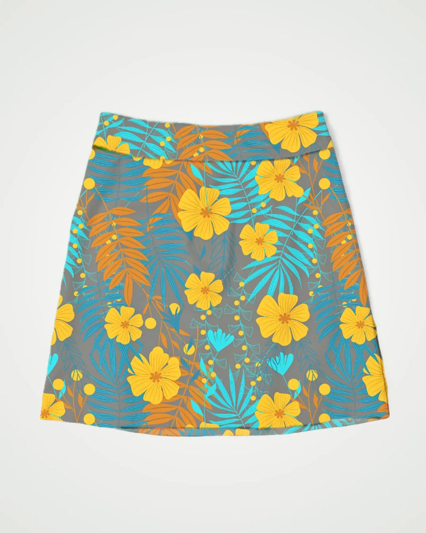 women's fitted golf skort with pockets in Tropical Mirage print - front view