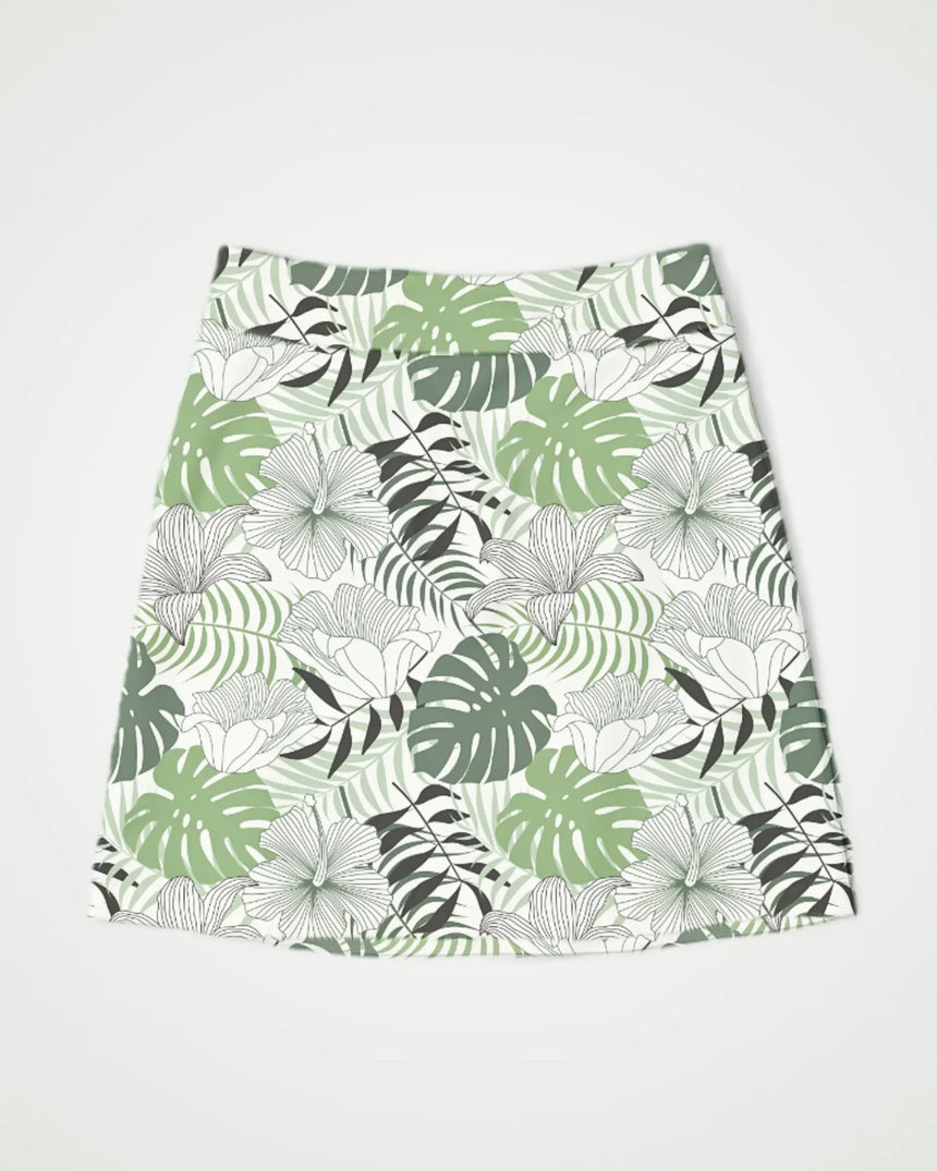 women's fitted golf skort with pockets in Zen Greens print - front view