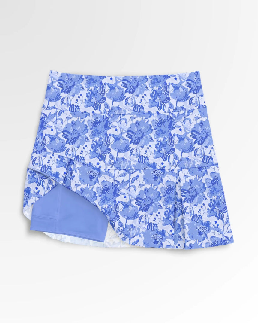 women's pleated golf skort with pockets in Ladybird Bloom print - front view