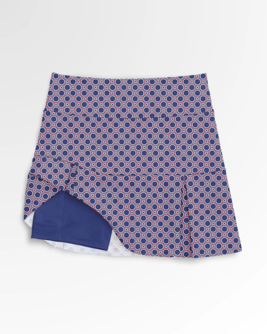 women's pleated golf skort with pockets in Lattice Links print - front view