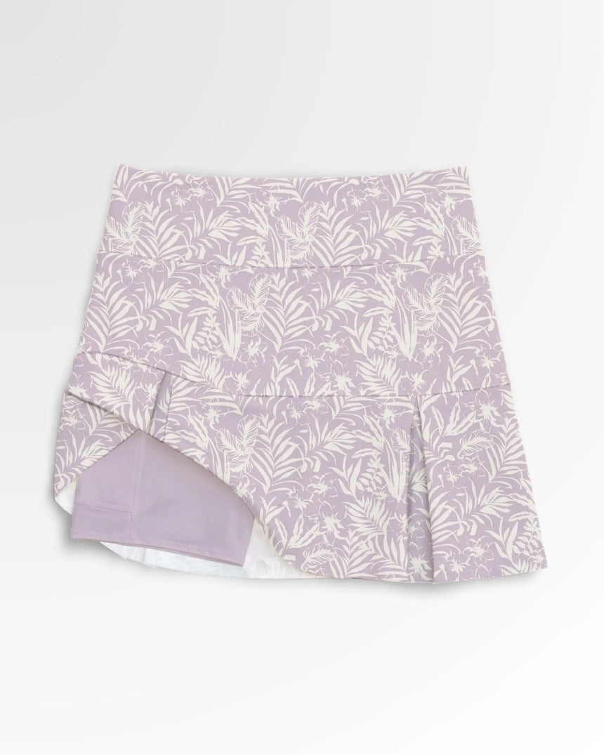women's pleated golf skort with pockets in Whispering Wedges print - front view