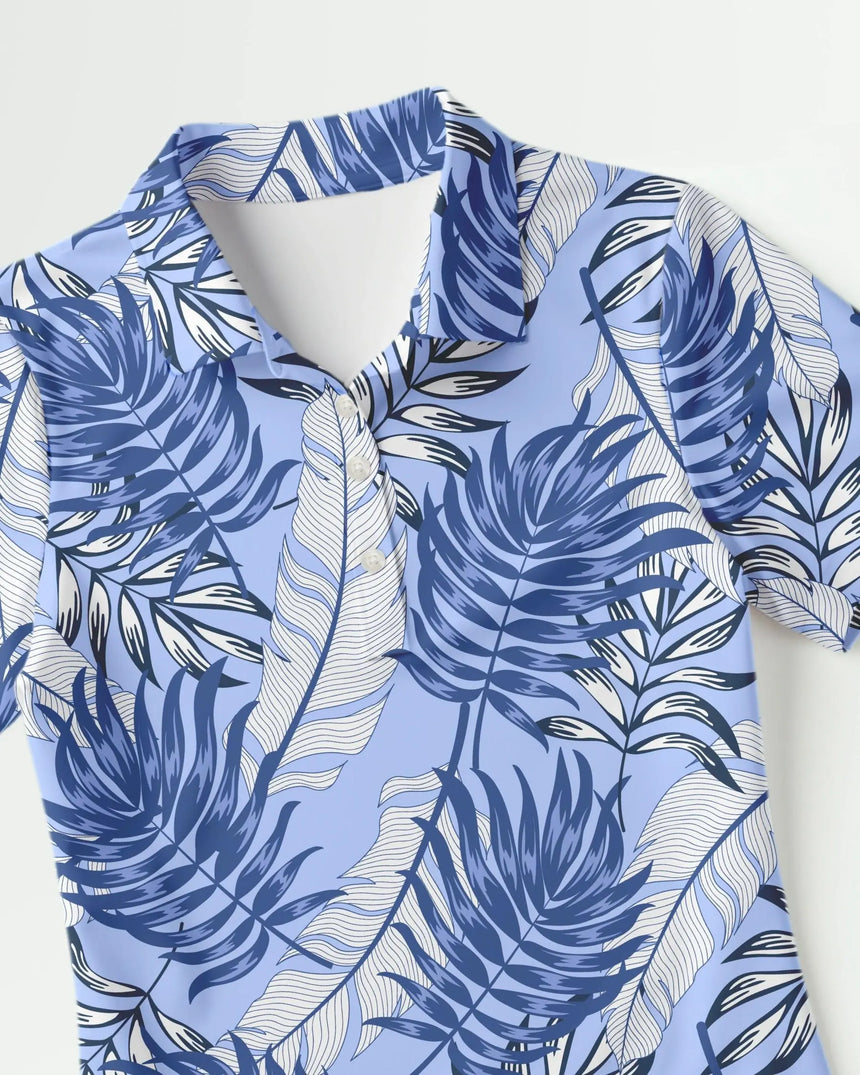 women's short sleeve golf polo in Blue Palms print - fabric closeup front view