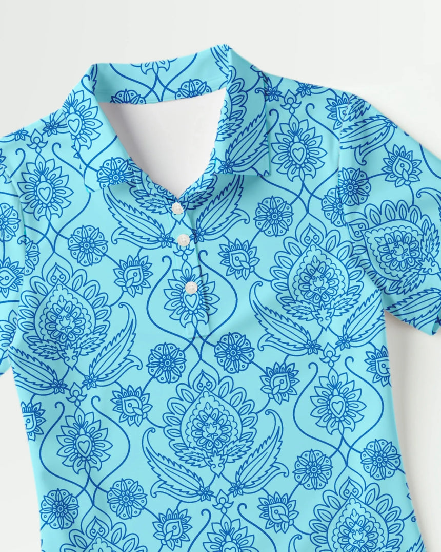 women's short sleeve golf polo in Fore de Fleur print - fabric closeup front view