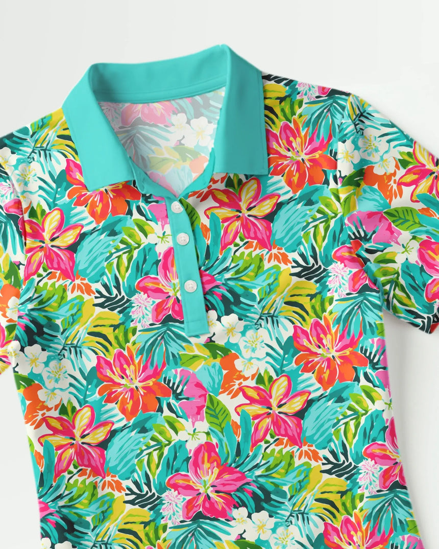 women's short sleeve golf polo in Luau Links print - fabric closeup front view
