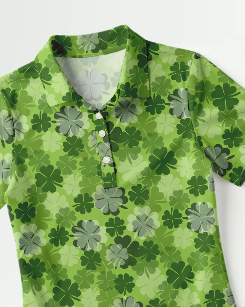 women's short sleeve golf polo in Lucky Clover print - fabric closeup front view