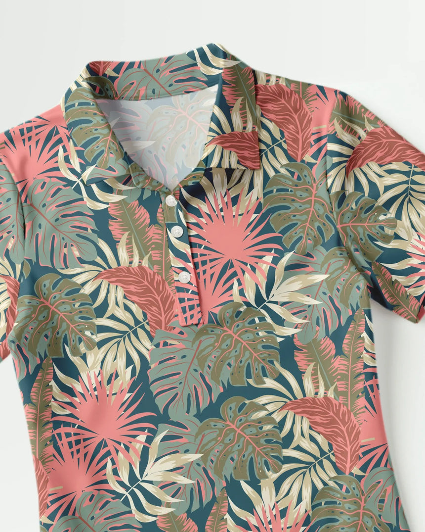 women's short sleeve golf polo in Palm Party print - fabric closeup front view