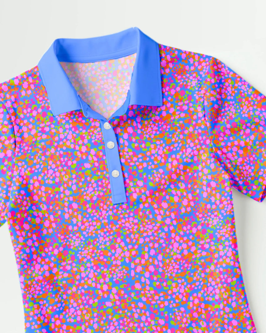 women's short sleeve golf polo in Par-tee Confetti print - fabric closeup front view