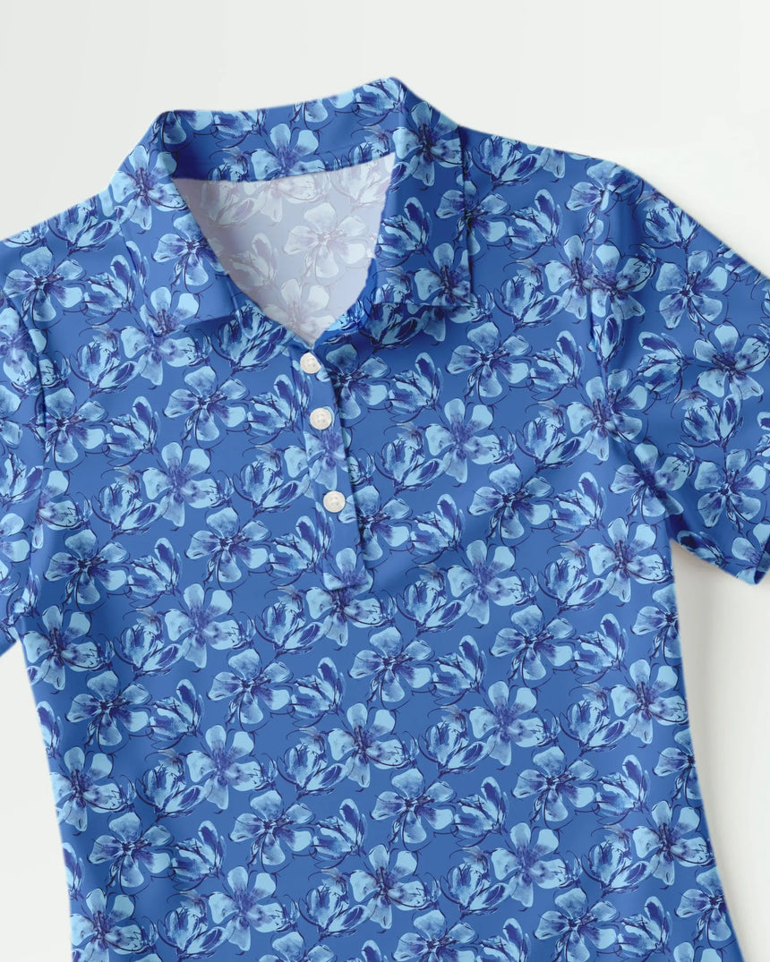 women's short sleeve golf polo in Par-Tee Petals print - fabric closeup front view