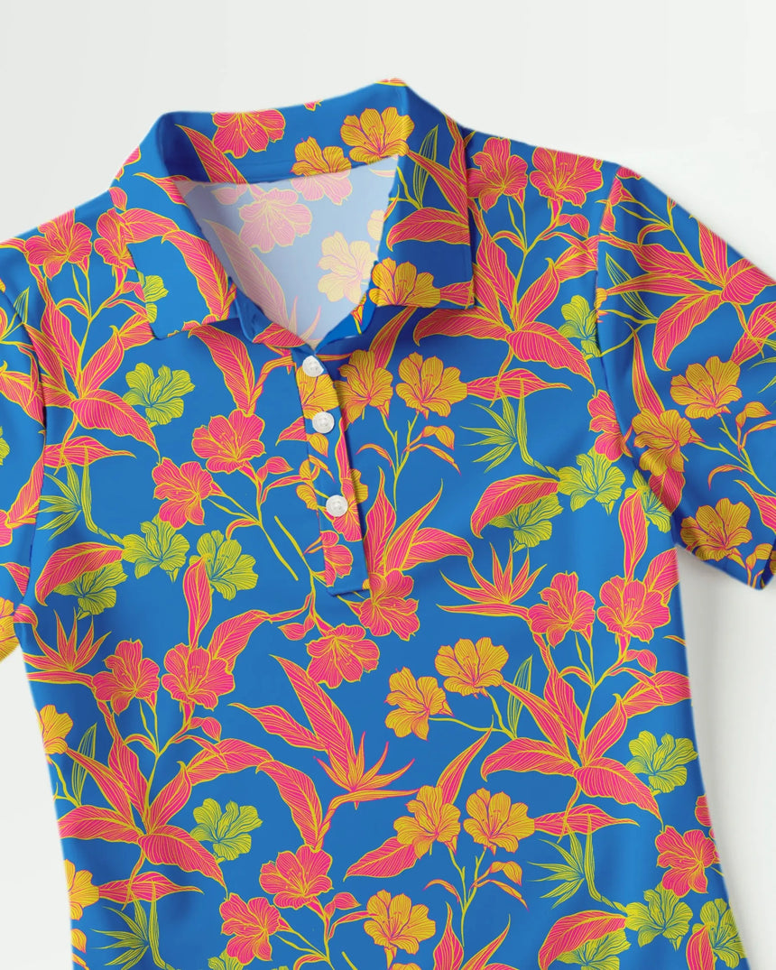 women's short sleeve golf polo in Paradise Found print - fabric closeup front view