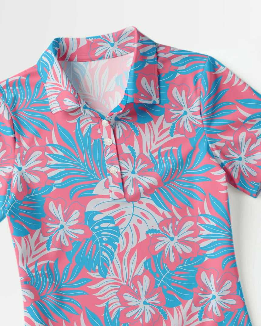 women's short sleeve golf polo in Pink Palms print - fabric closeup front view