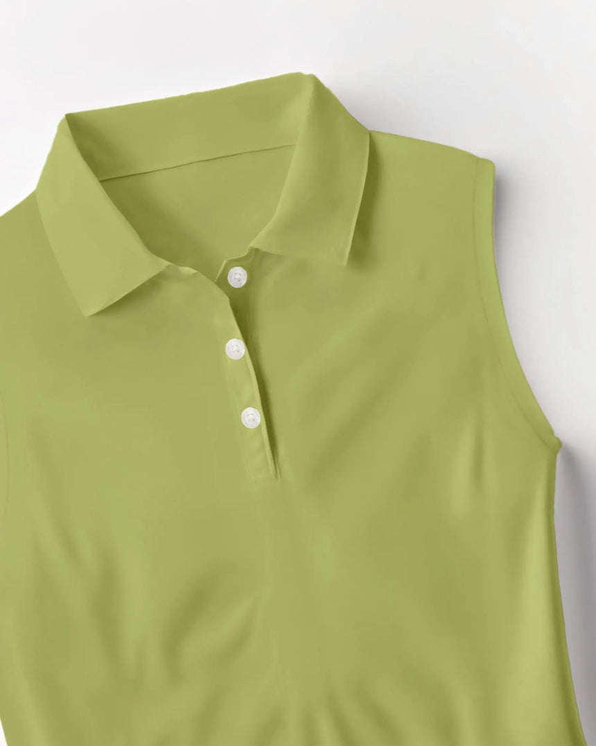 women's sleeveless golf polo in Garden on the Green print - fabric closeup front view